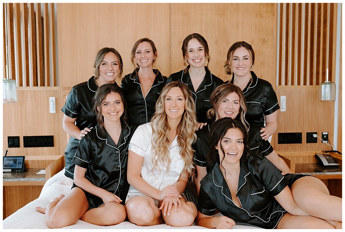 bridesmaids posing for spring destination wedding at the Secrets Bahia Mita Surf and Sand Resort