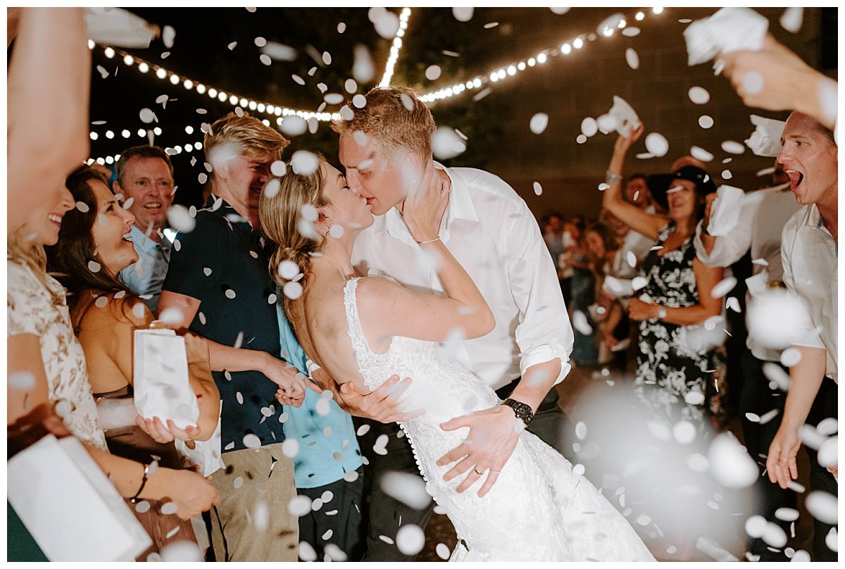 bride and groom rose petal toss for wedding at the south coast winery